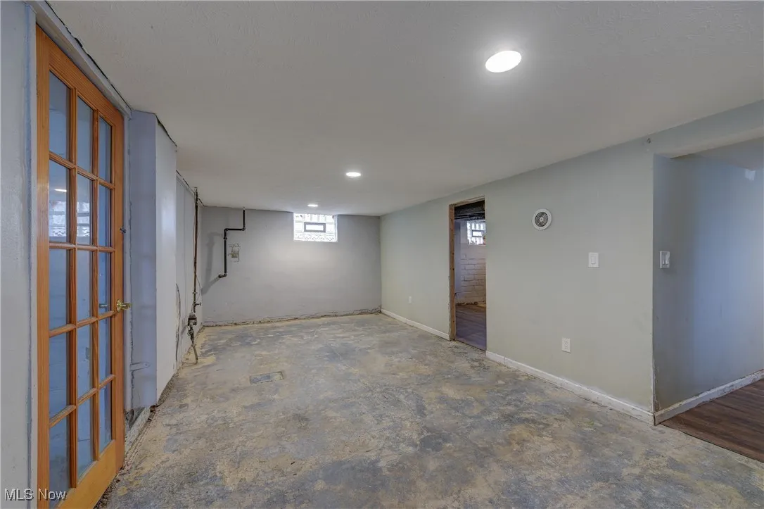 Below grade area featuring recessed lighting