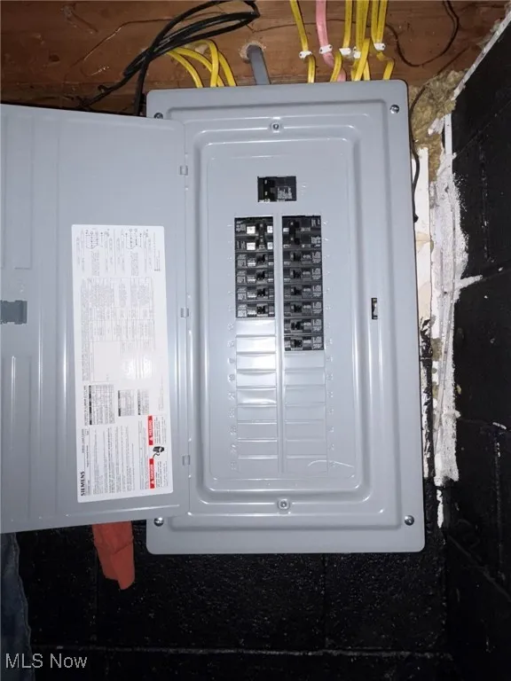 Utility room featuring electric panel
