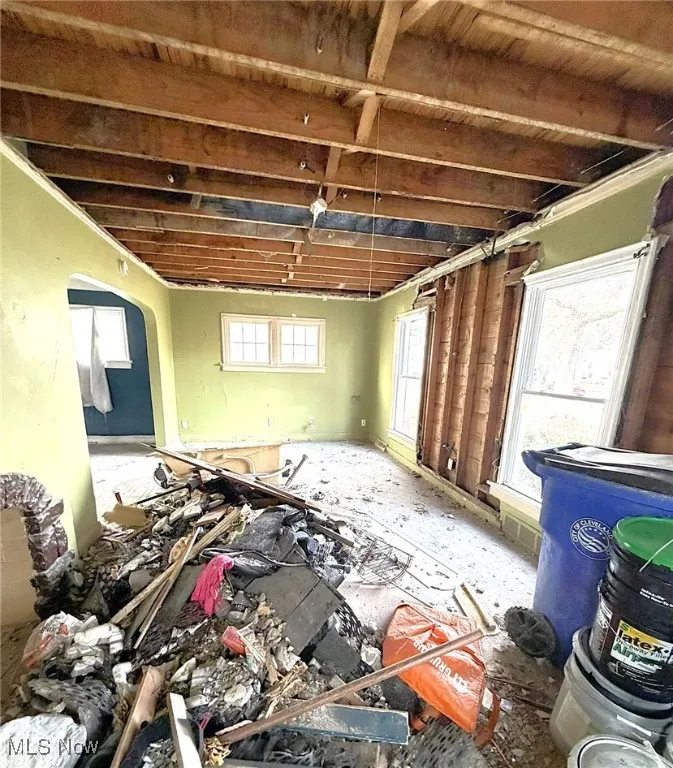 Miscellaneous room featuring arched walkways