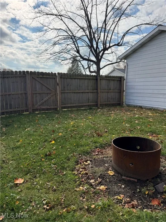 View of yard with a gate