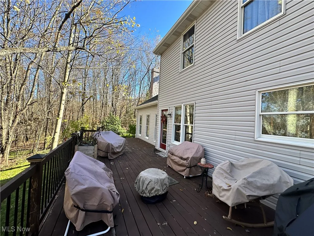 Wooden deck with a grill