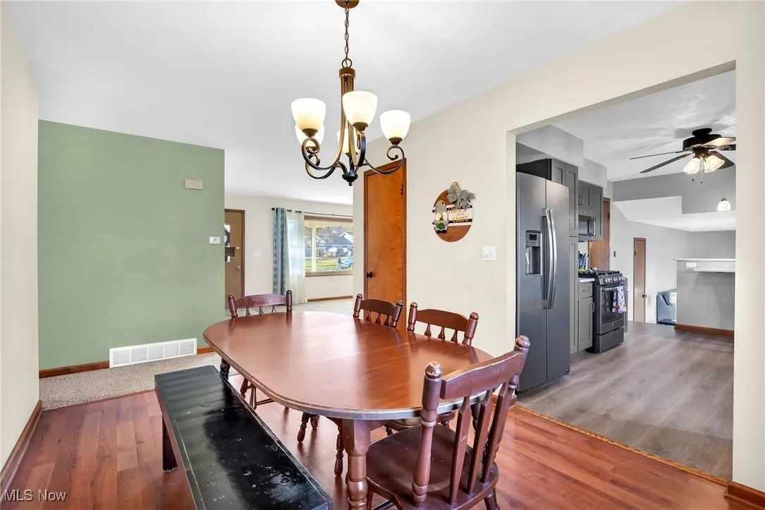 Dining room positioned between the living room and kitchen