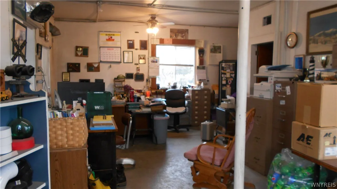Office Bay is 14' x 25' with 9' ceiling.