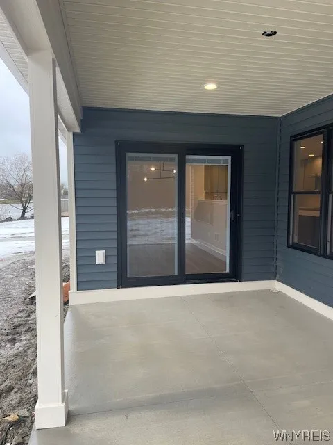 Covered patio off the sunroom