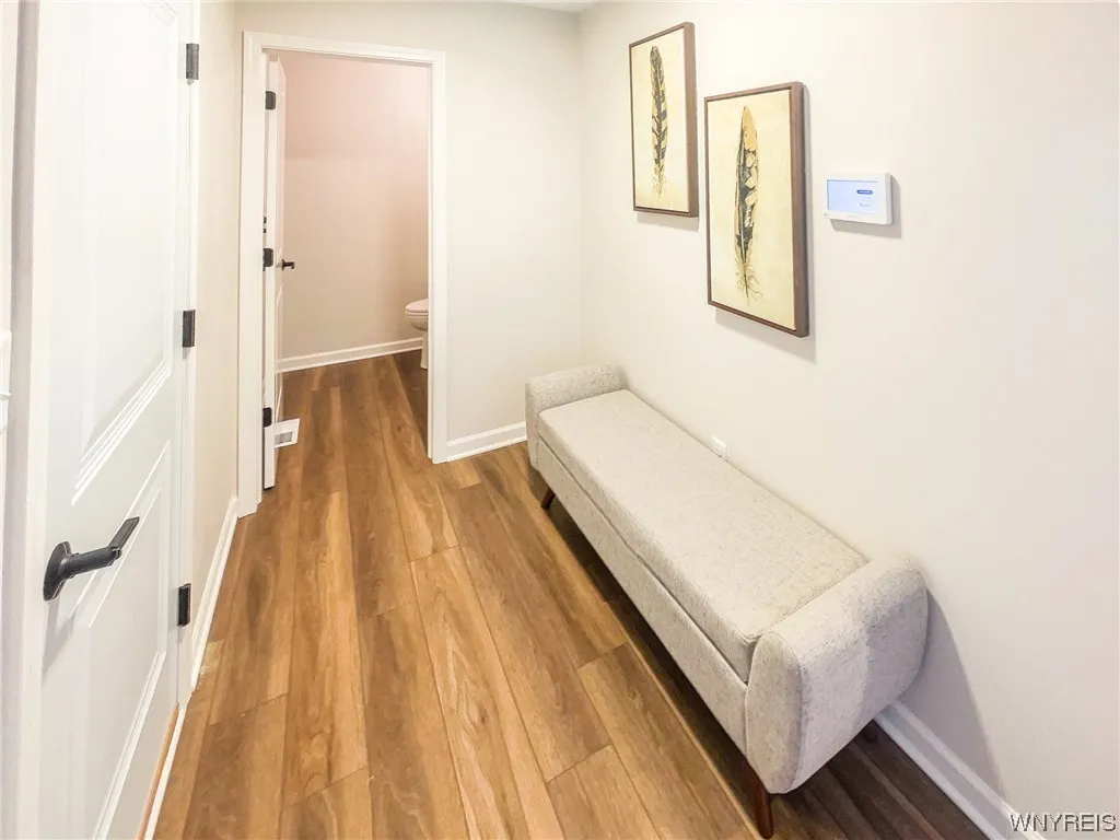 mudroom leads to half bath