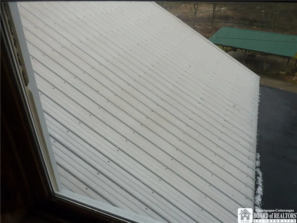 Metal room on rear of the building