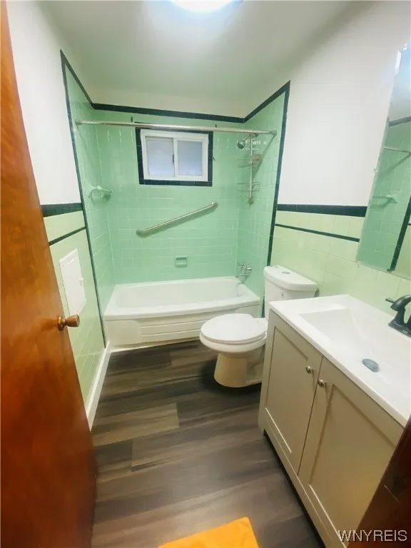 Updated vanity & flooring, water efficient toilet
