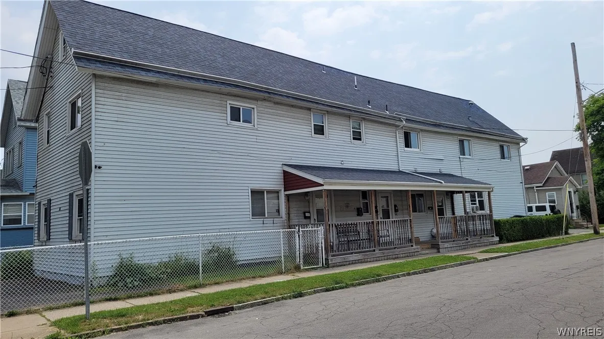 4 unit w/3 garages 1st Ward. 3 garage spaces and side parking lot!
