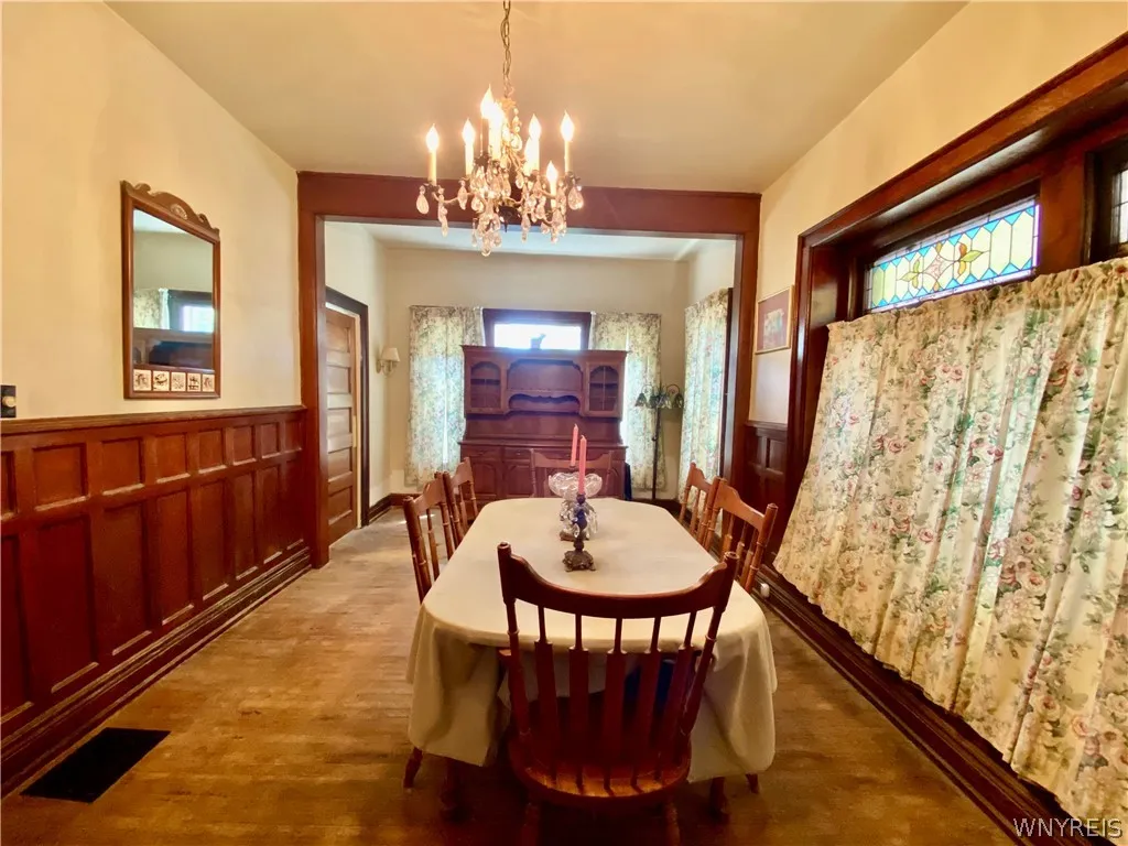 Large dining room with great woodwork and moldings.