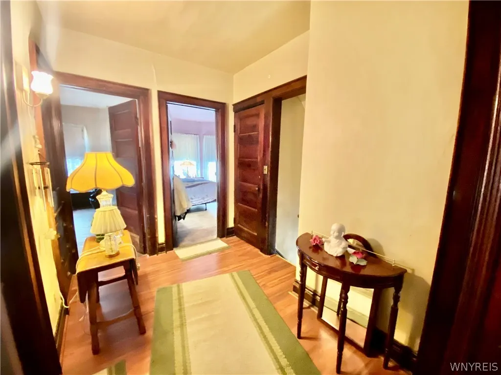 2nd floor landing to 4 bedrooms and full bathroom.  Also door to walk-up attic.