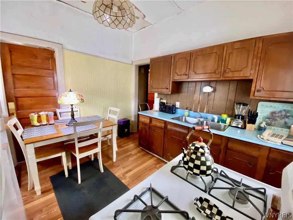 Door from kitchen to former butler's panty, now larger dining room.