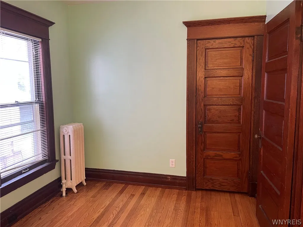 Bedroom across hall from full bath