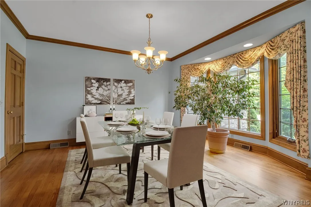 Dining room has been virtually staged