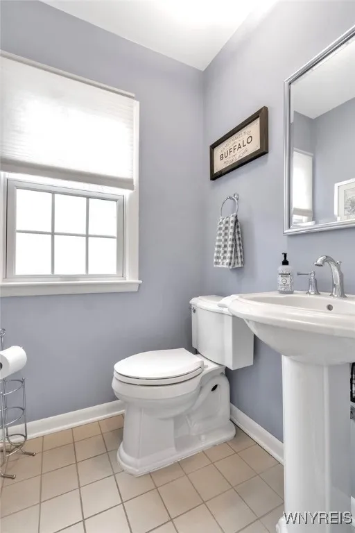 Remodeled half Bath has pedestal sink