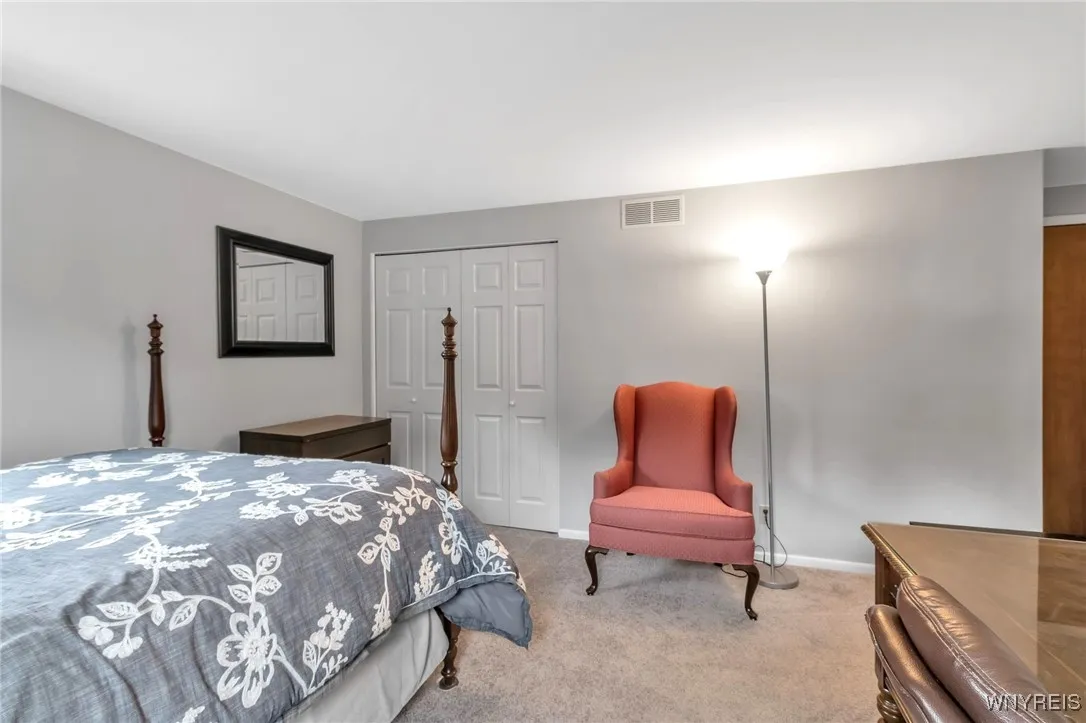 12x12 BDRM shows closet with bifold doors