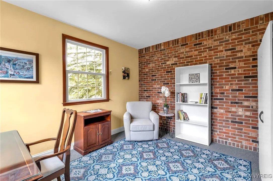 1st floor DEN with unique bricked walls