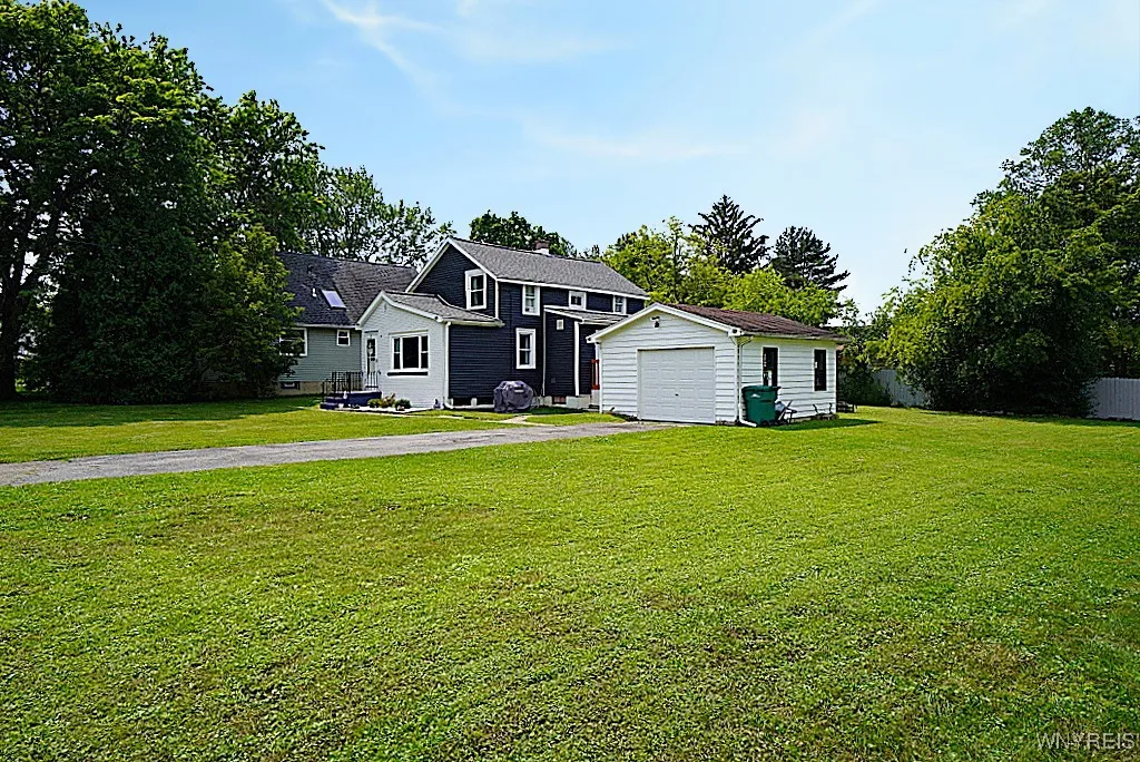 side view of home with large double lot