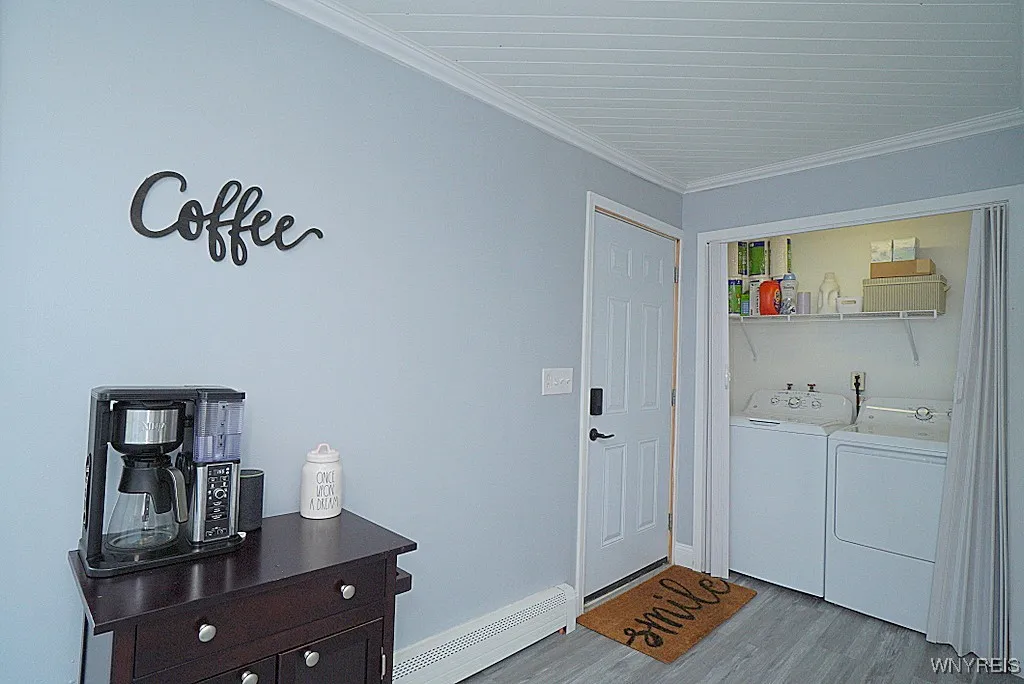 side door to side deck and garage with 1st floor laundry (sliding doors cover space)