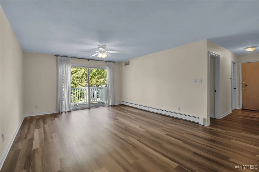Lovely open Living Room with sliding doors to Balcony...