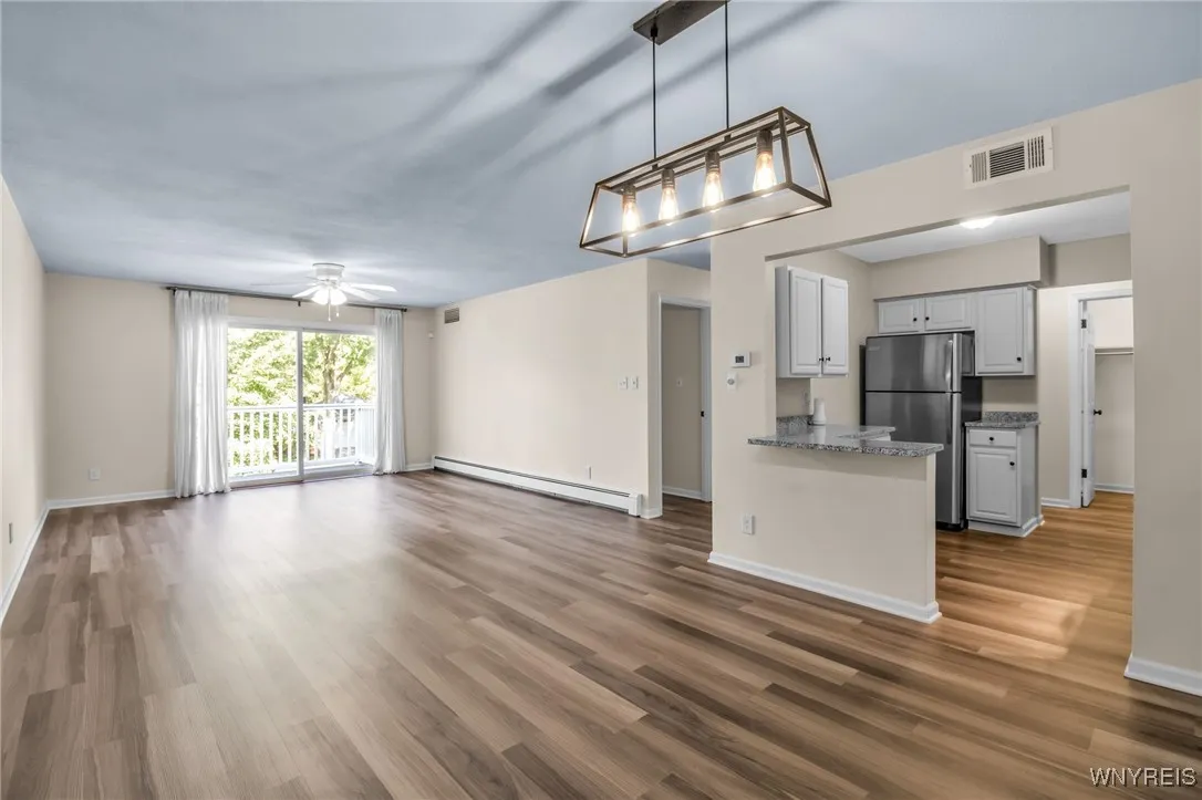 Large Dining Area with breakfast bar from Kitchen...
