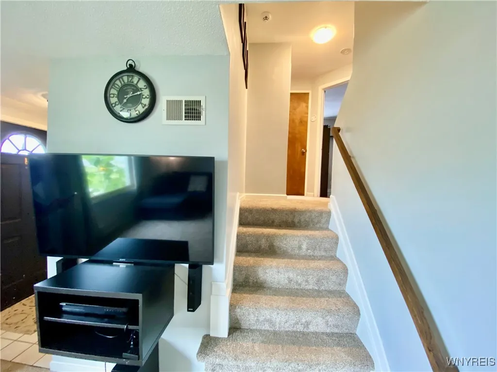 Stairs from living room to the 2nd level.