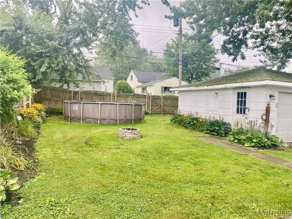 Back yard and room for lots of fun and games.