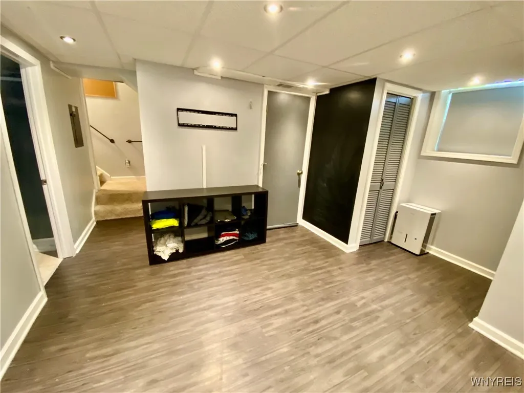 Great family room area for kids to play, Bills games, man cave, and so much more.