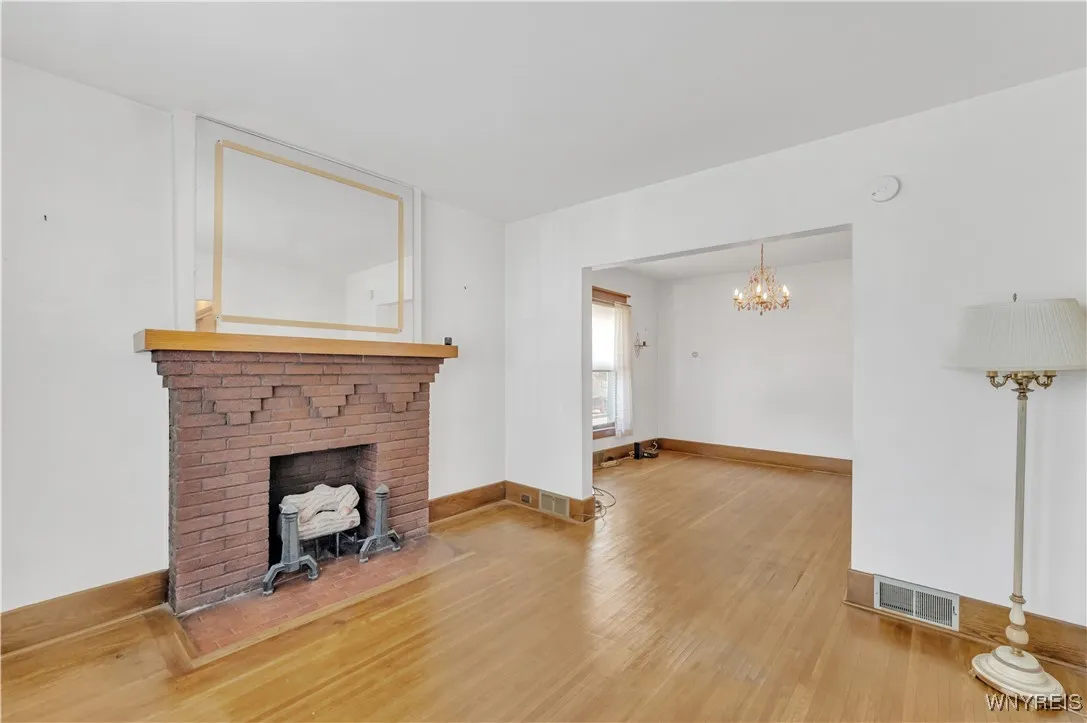 Downstairs Living Room Features Gas Fireplace