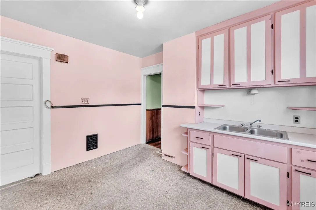 Upstairs Kitchen - Door is to Bedroom