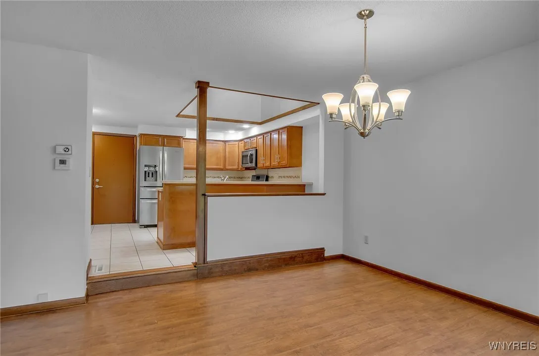 view from dinning room into kitchen