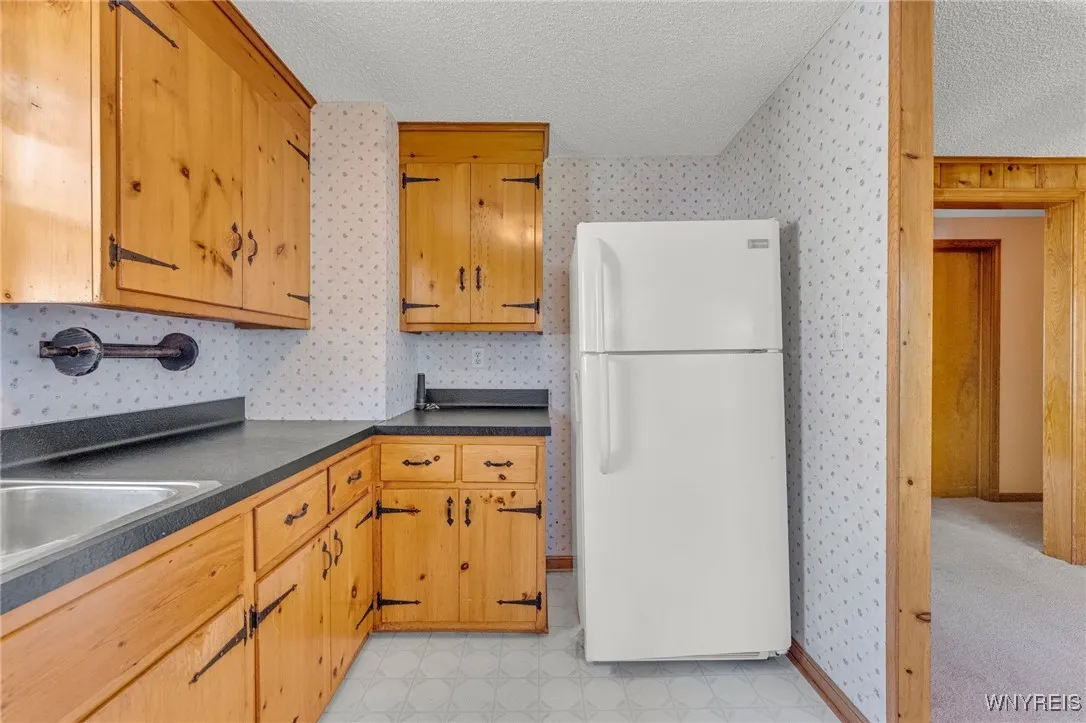 The wood cabinets and trim in this house looks like new