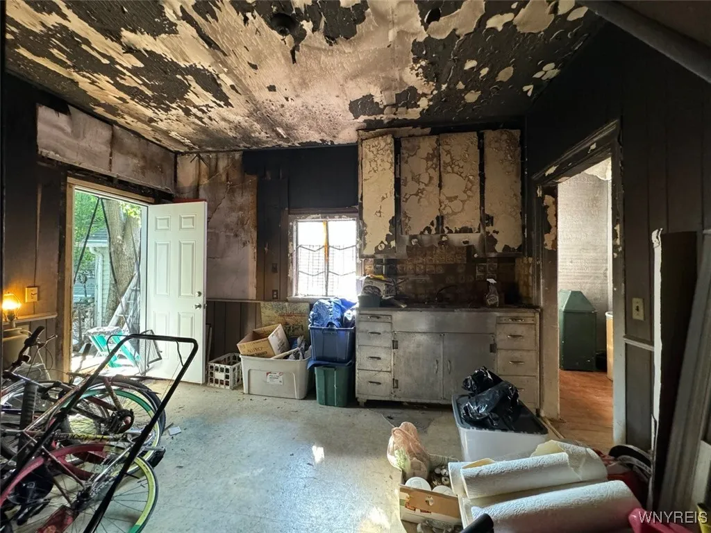 Kitchen has smoke damage from a fire 10 years ago