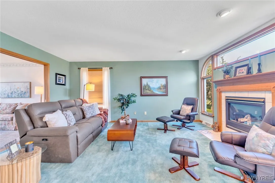 Family Room view with pocket french doors open to Living Room.