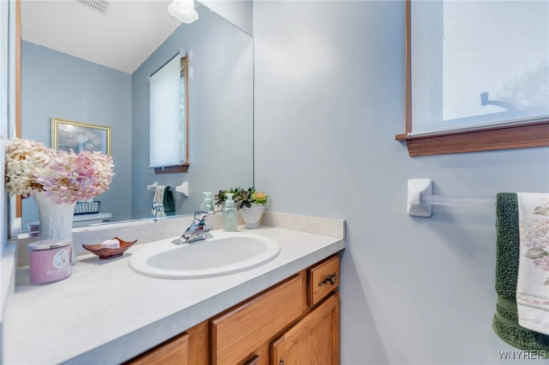 Across from the garage entance is this first floor Half Bath.