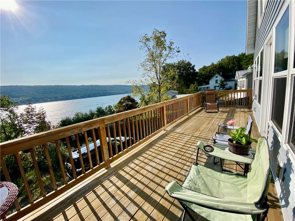 ENTERTAINMENT SIZED DECK WITH PANORAMIC LAKE VIEWS!