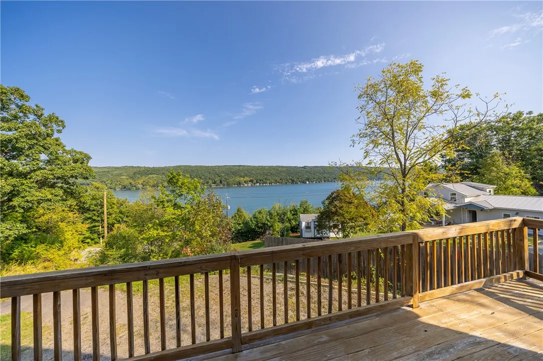 ENTERTAINMENT SIZED DECK WITH PANORAMIC LAKE VIEWS!