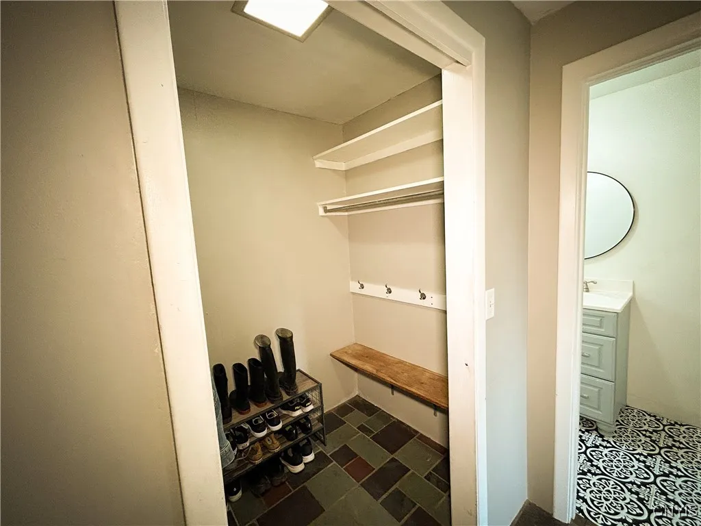  Mud Room with seating and storage.