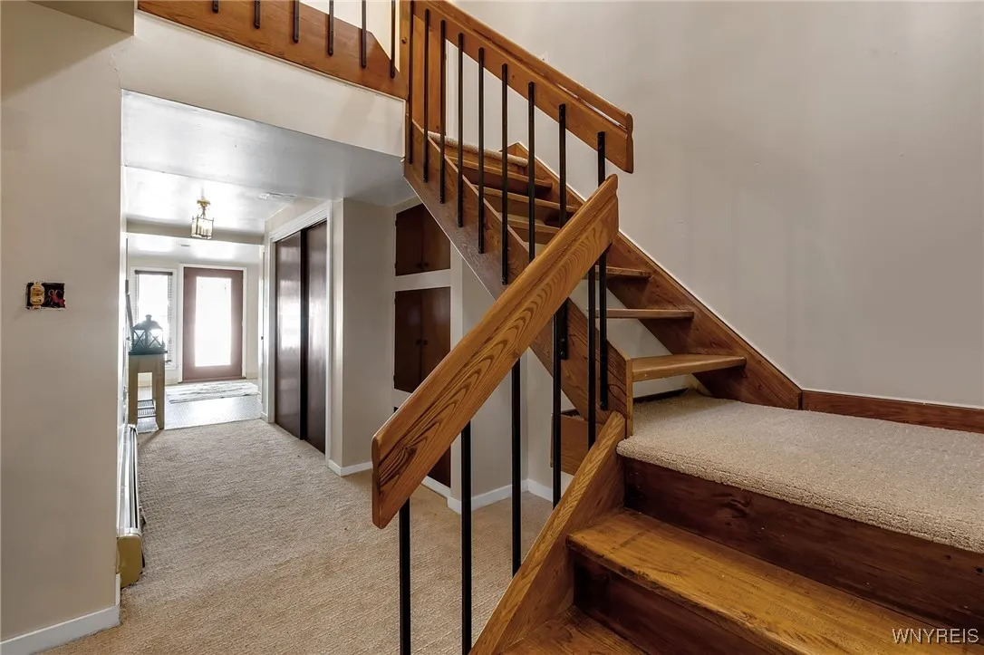 Staircase to second floor
and hallway to right wing
