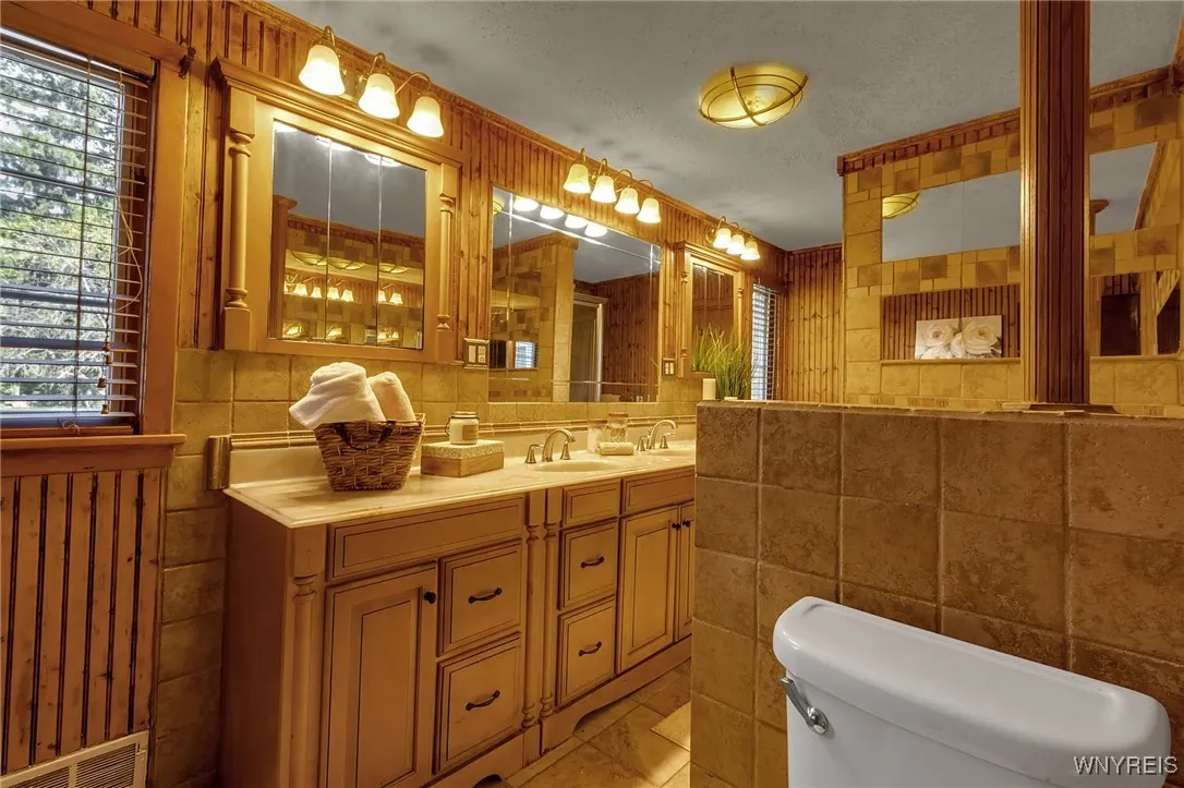 Full bath 1 w tub and shower/ double sinks (left wing)