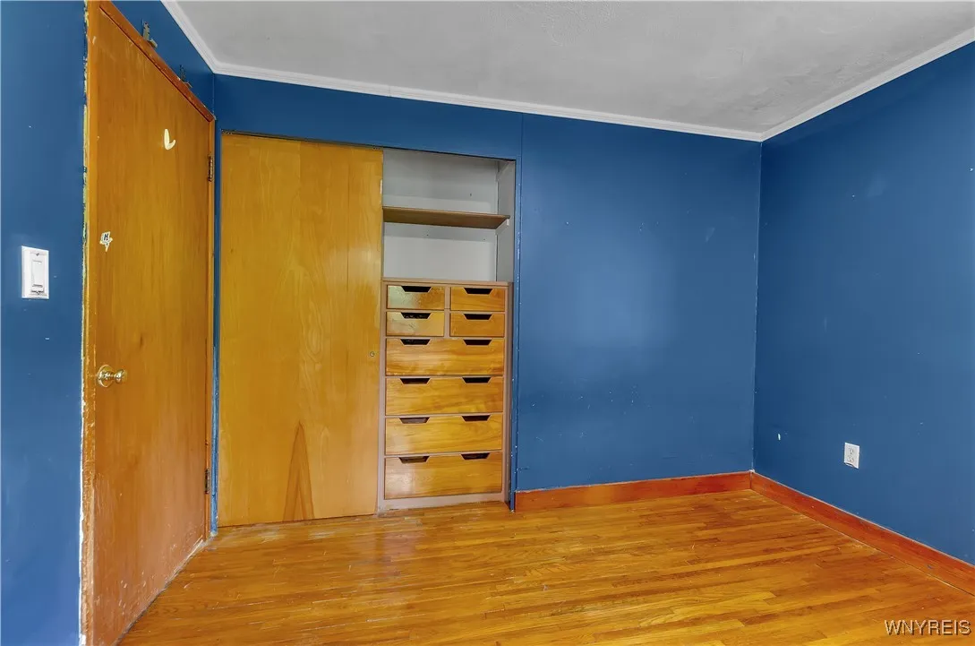 Bedroom includes built ins in the closet