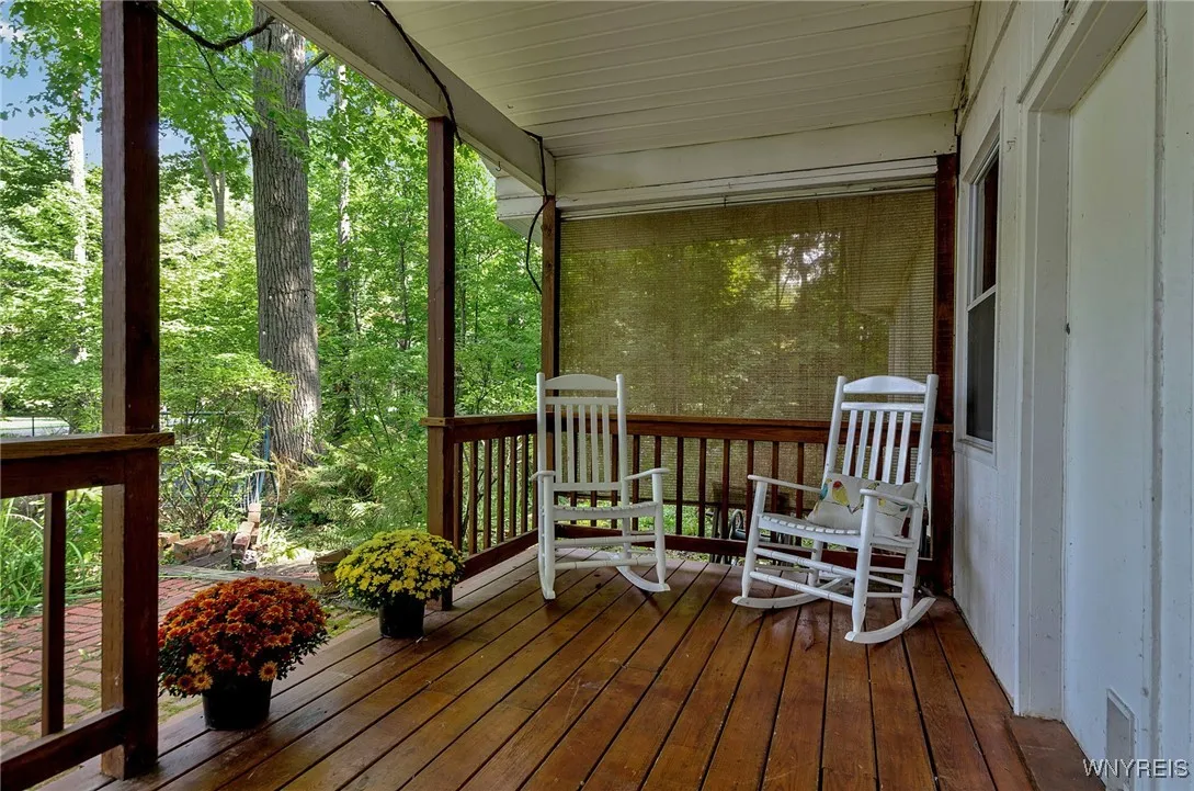 Enjoy this deck off of the kitchen overlooking the large yard on the Elmhurst Drive Side of the home