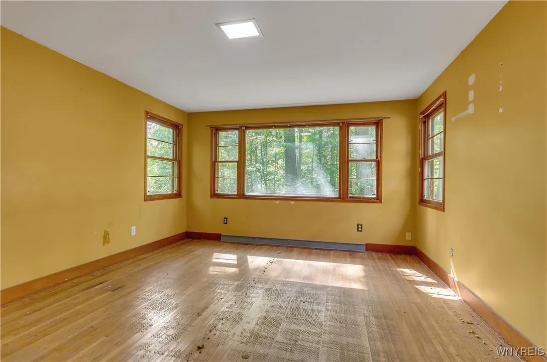 Owners suite bedroom full of light