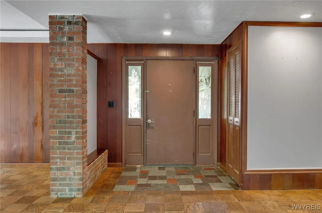 Entry door from the Woodland Drive side