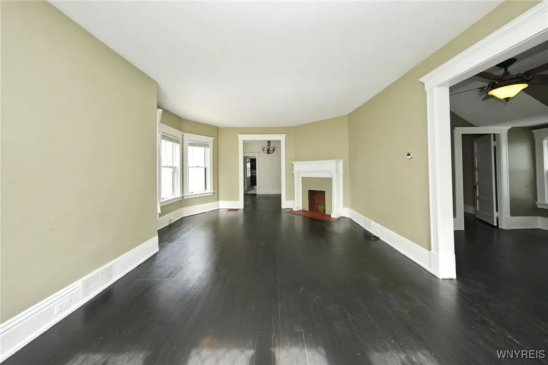 Living room with decorative fireplace
