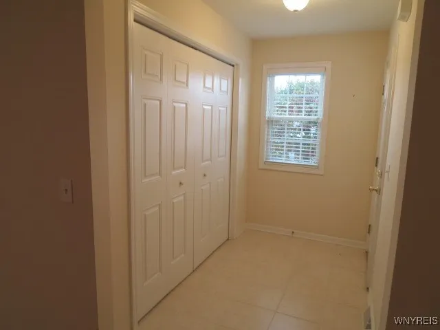 Enter your foyer with great size closet...