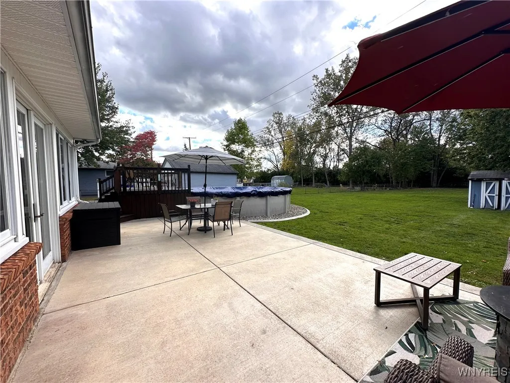 Beautiful patio with access to rear deck and pool