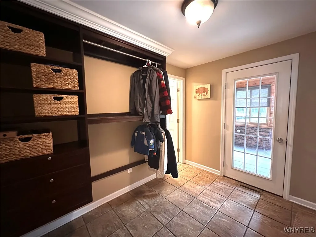 mudroom with 1/2 bath