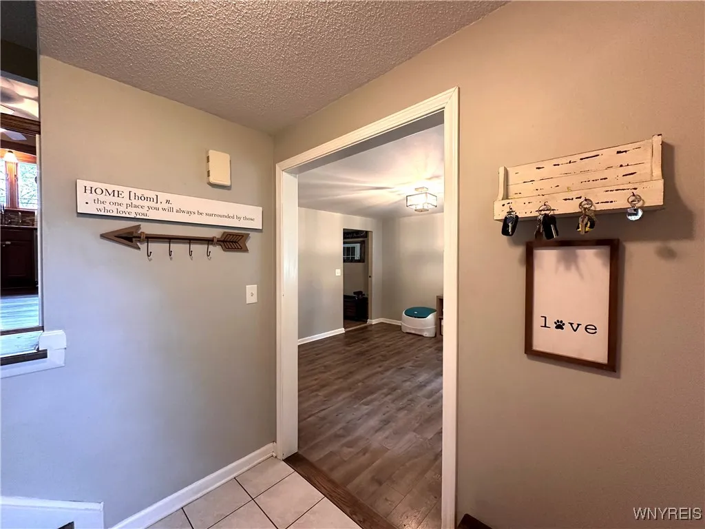 front entry to living rm and family​​‌​​​​‌​​‌‌​‌‌​​​‌‌​‌​‌​‌​​​‌​​ room
