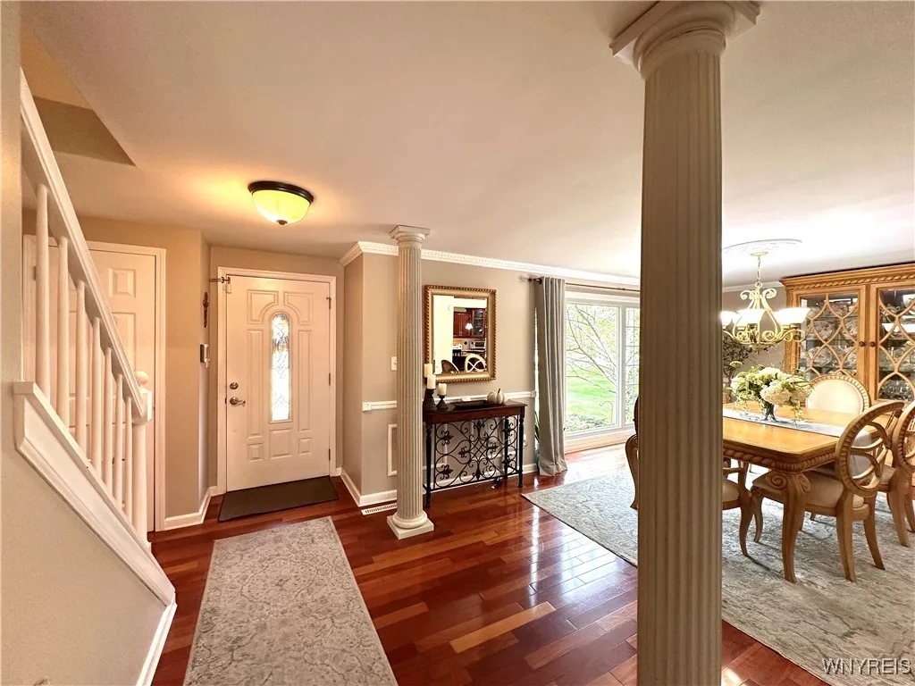 Brazilian Cherry Hardwood foyer, dining room and kitchen
