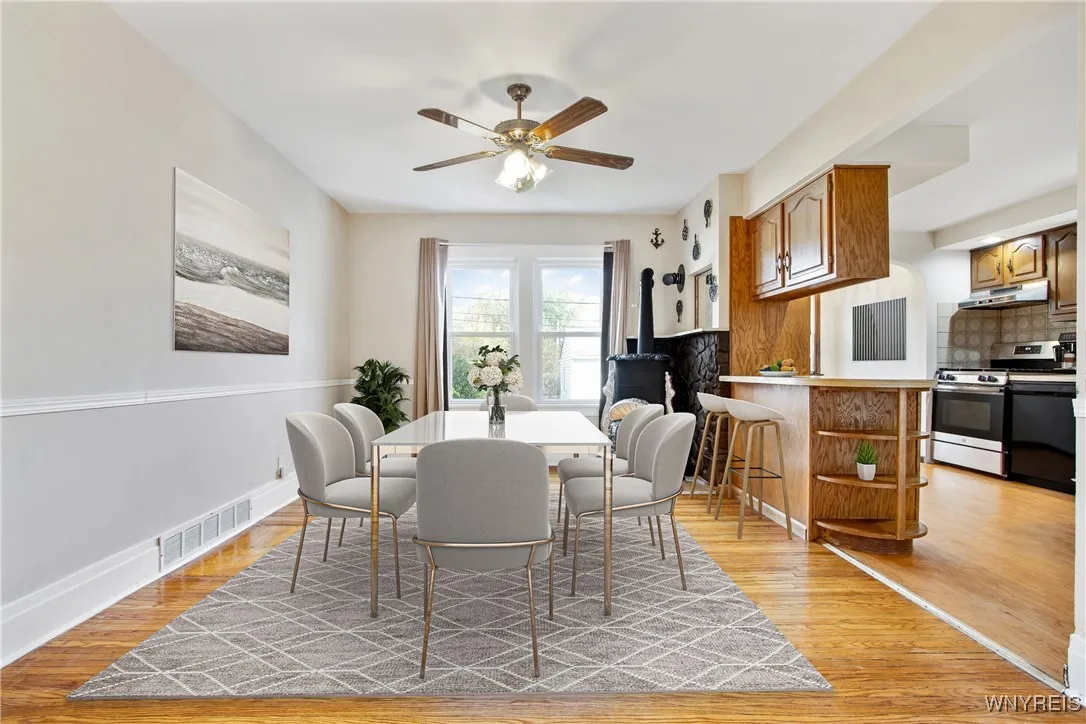 Dining room (staged) with WBFP (as is)